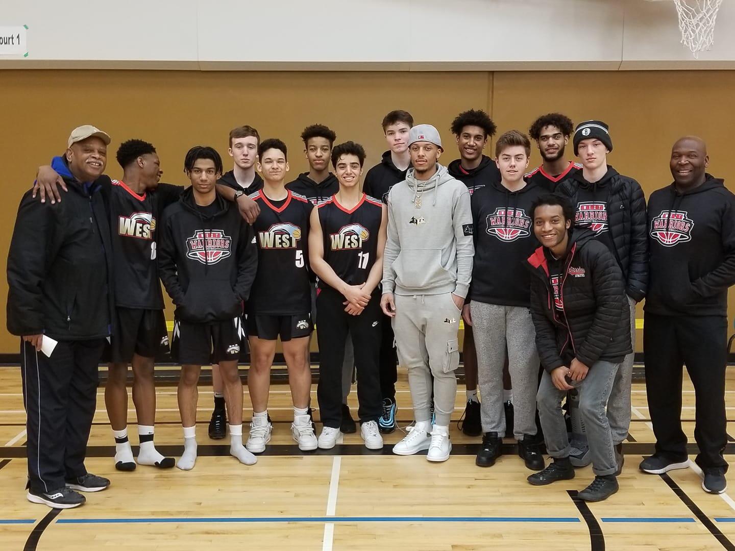 Fred Perry with a Halifax high school basketball team in a gymnasium